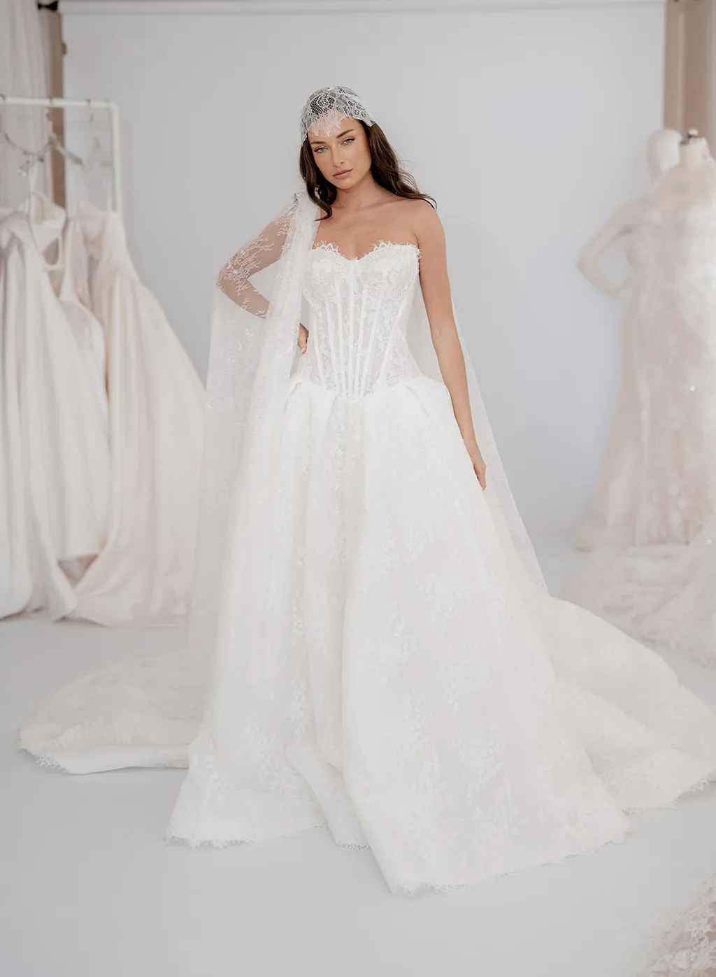 Adeline lace bridal gown with a structured corset and full skirt, thumbnail 8