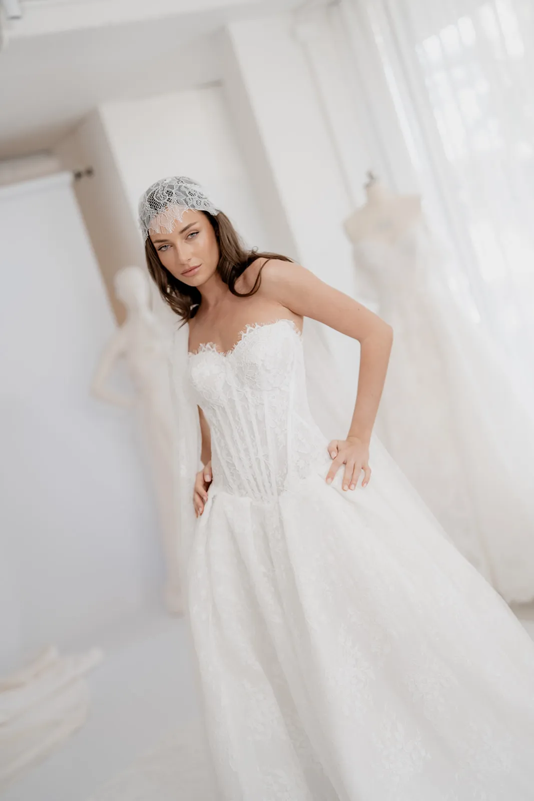 Adeline lace bridal gown with a structured corset and full skirt, thumbnail 9