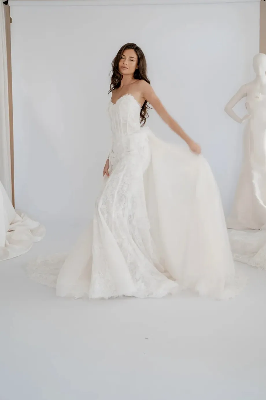 Arabella fitted lace gown with a flowing detachable overskirt