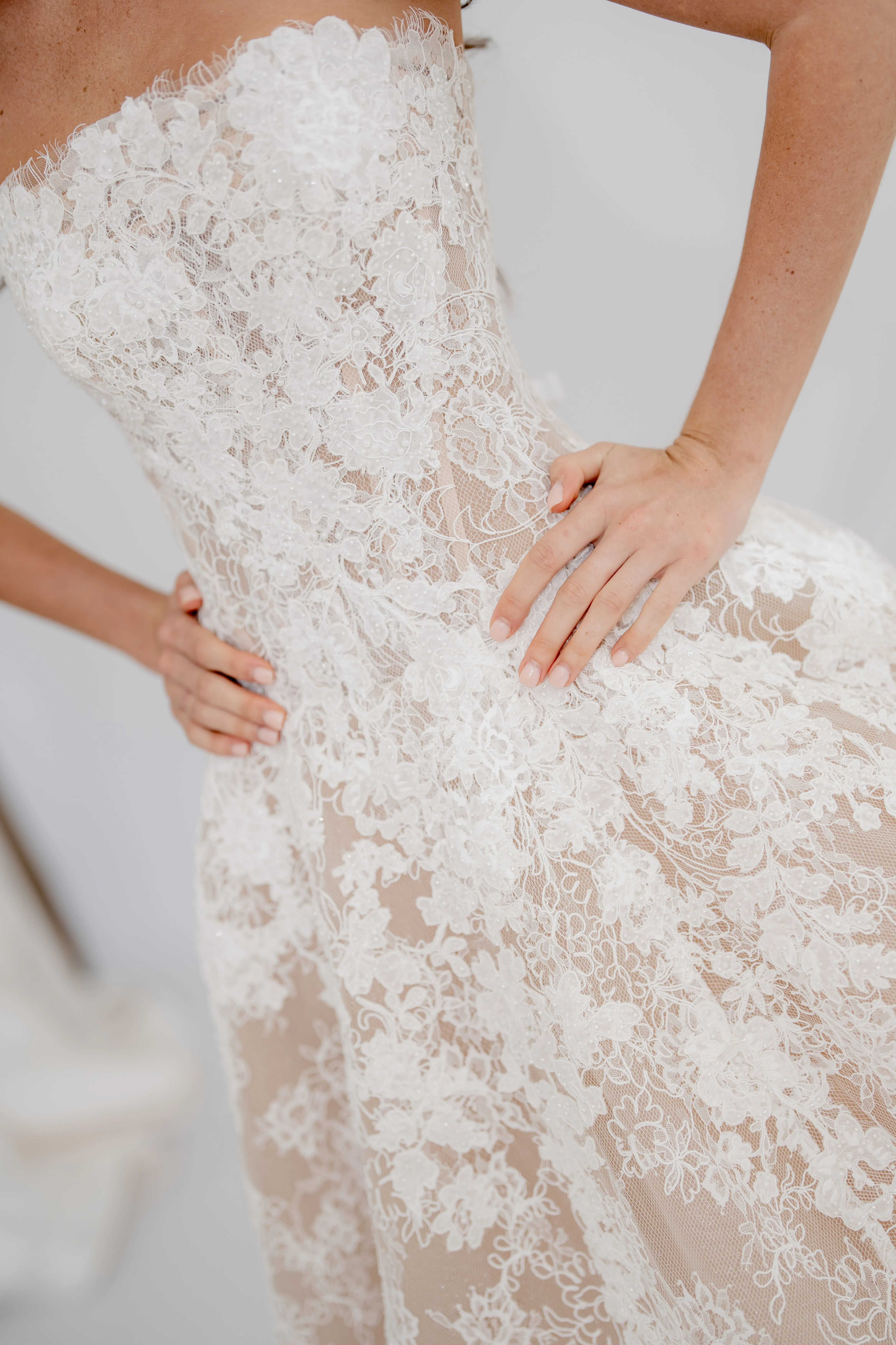 Aurelia nude-base lace ball gown with a sculpted strapless corset