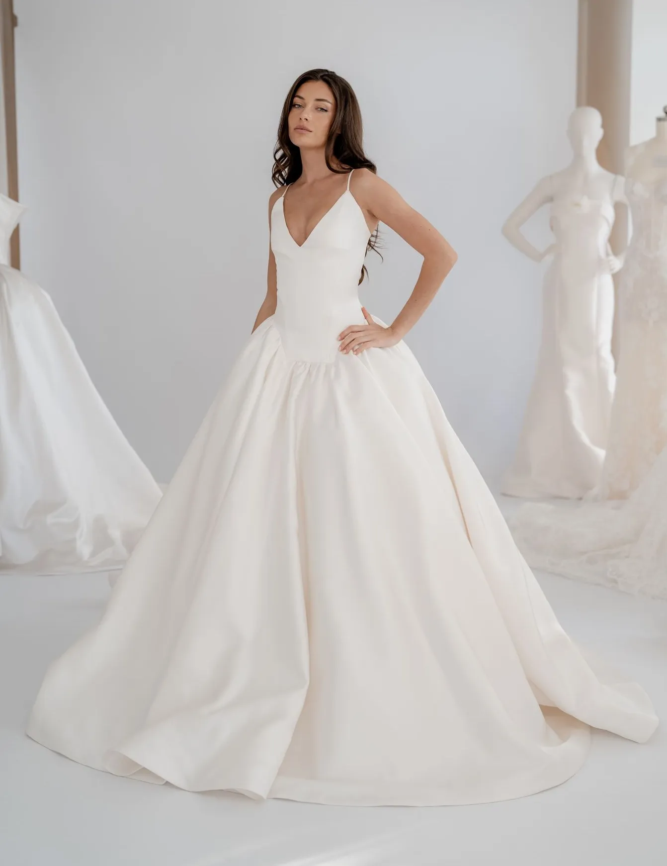 Celine satin drop-waist gown with spaghetti straps and a deep V-neckline